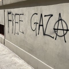 Le scritte durante la manifestazione