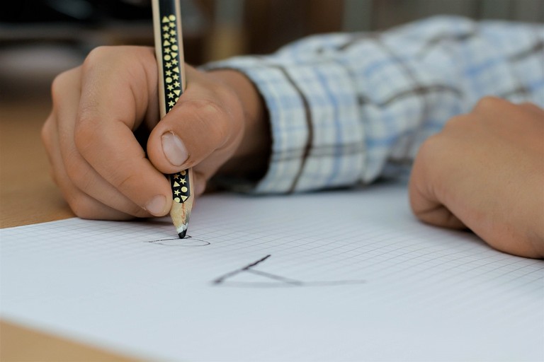 bambino scrivere