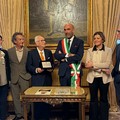 Il ricordo di Nino Rota nella barberia Manobianco: una storia che dura da oltre 60 anni