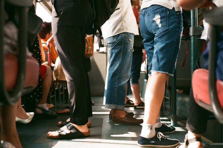 Passeggeri su un bus